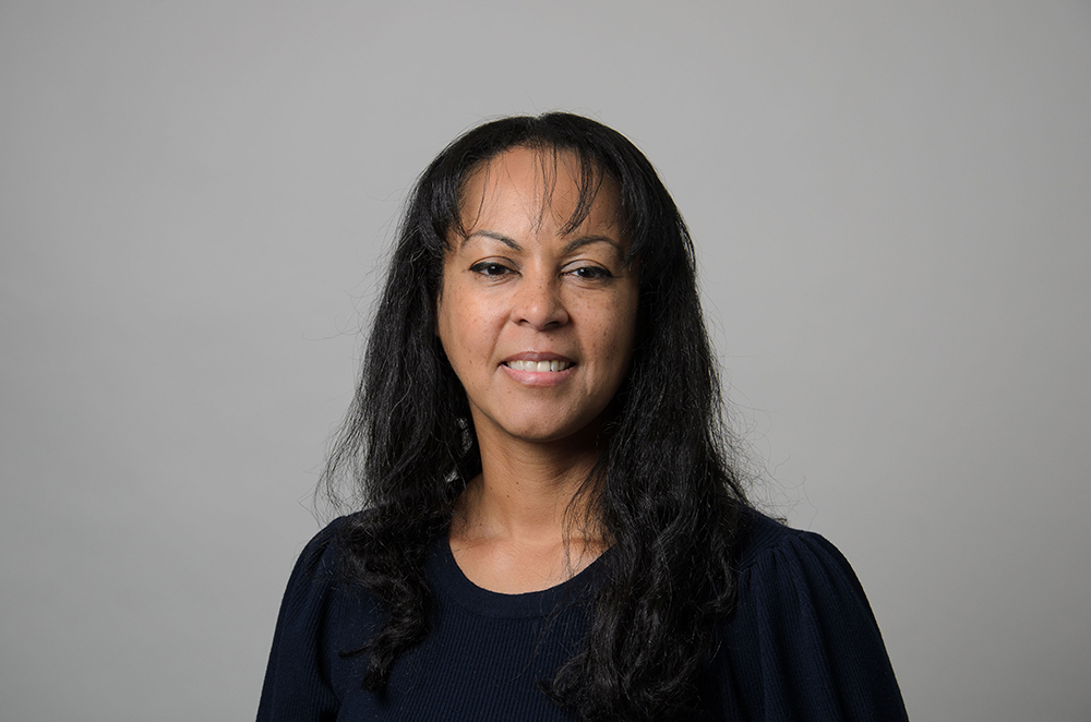 Portrait of Tara Malone wearing a black shirt.