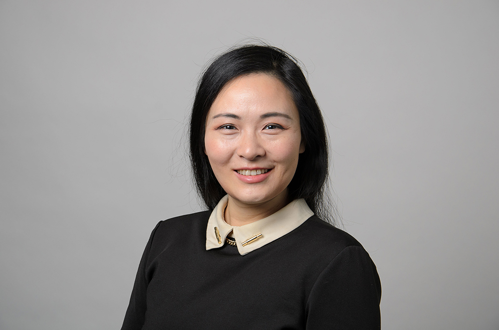 Portrait of Karen Xie wearing a black sweater.